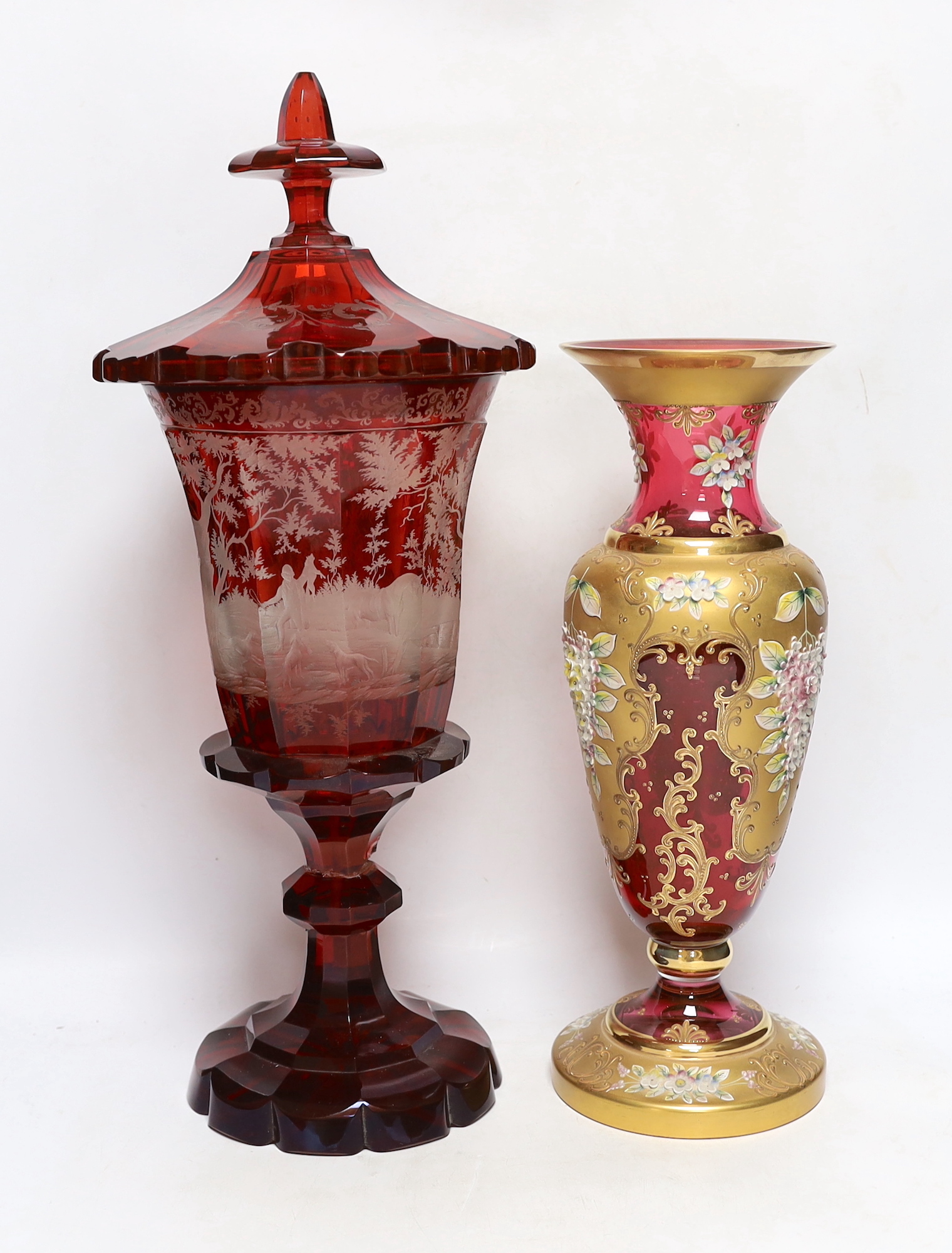 A late 19th century Bohemian ruby flashed and wheel engraved glass vase and cover, 52cm high and a Venetian enamelled glass vase